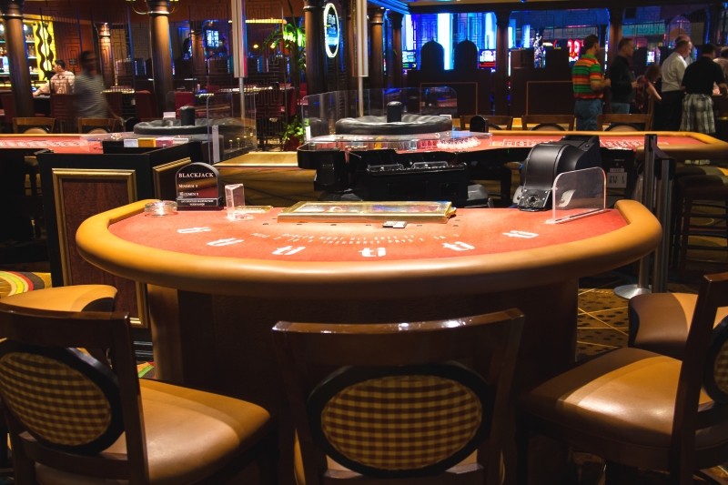 10985351-gaming-tables-in-the-lobby-of-casino-treasure-island-las-vegas